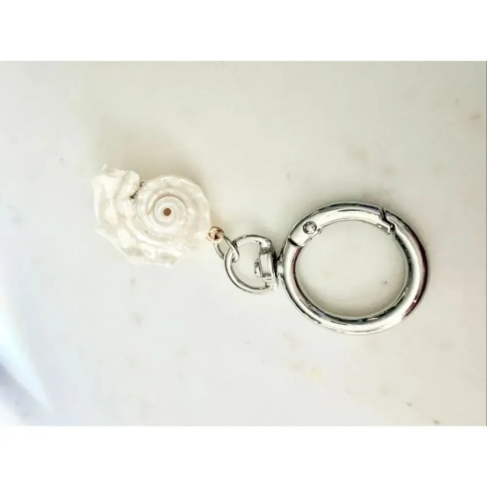 Pearlescent with silver color seashell keychain
